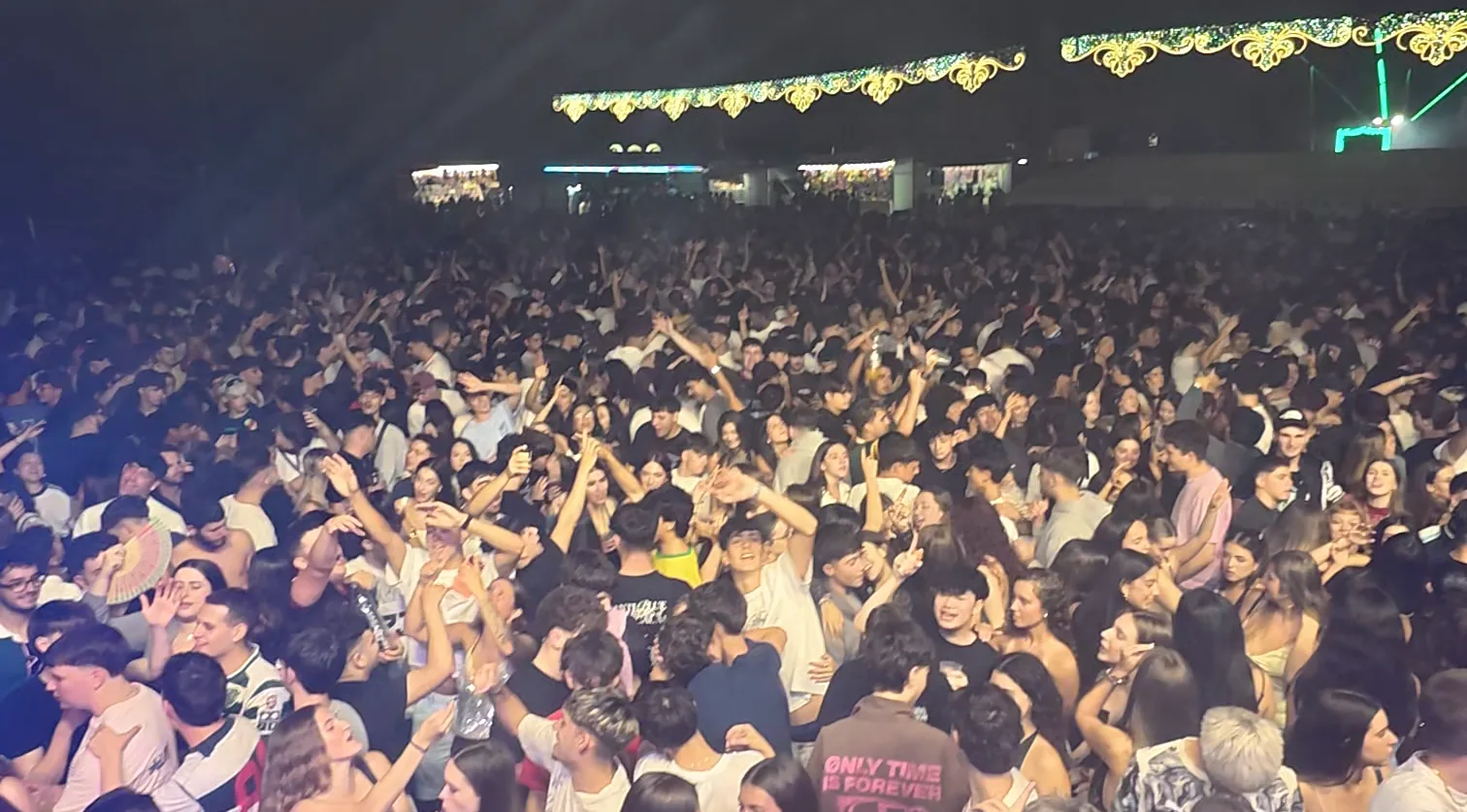 Crowd with raised hands during an IWARO set